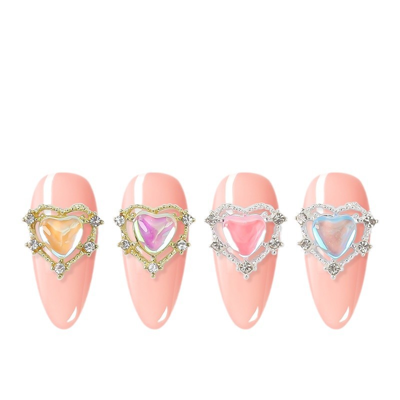 Nueva joyería de uñas Rojas netas Nueva Aurora en forma de corazón de diamantes de oro y plata Corazón de melocotón Diamante grande linda chica bonita yema de los dedos decoraciones