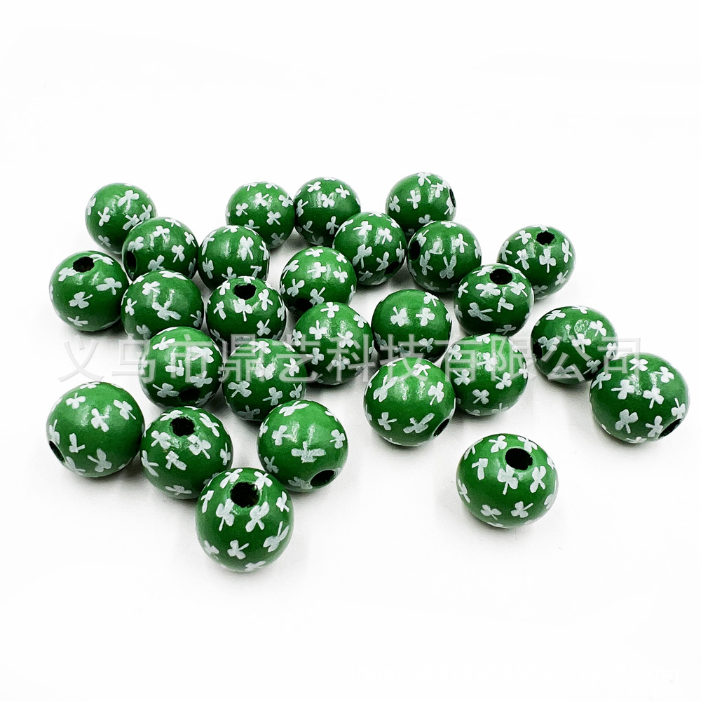 卸売りプリント木珠アイルランド日木珠クローバー四葉草形散珠diyビーズアクセサリー部品