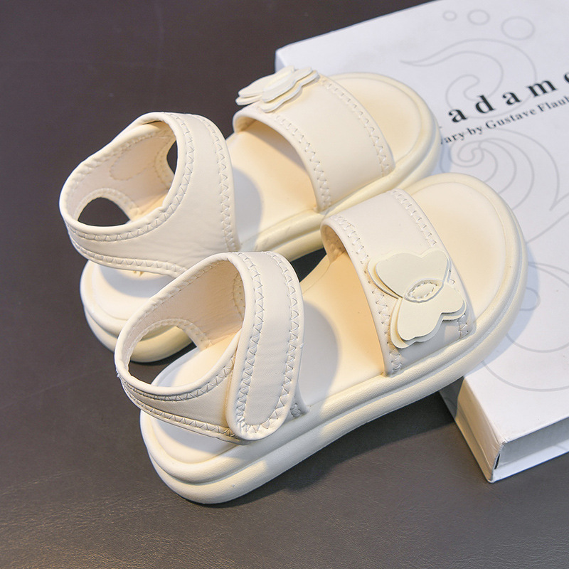 Zapatos casuales de moda de niñas versátiles 2026 verano nuevos niños sandalias de dedos abiertos huecos zapatos de princesa mariposa
