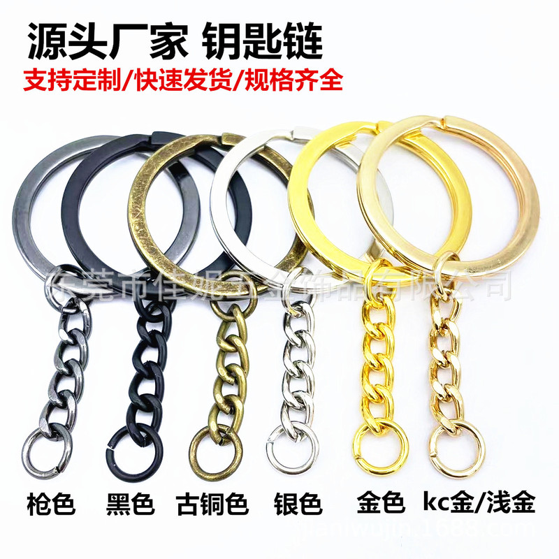 元のメーカーの現物の金色のキーホルダーは四つのチェーンを持っています。|undefined