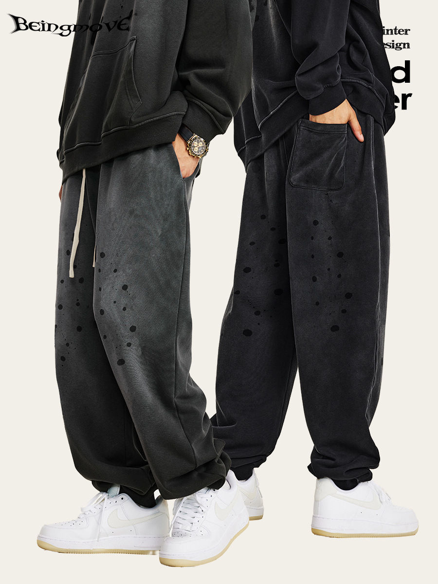 Otoño y invierno de 2025 marca de moda retro agua lavado pantalones de pintura hombre pantalones casuales de correa sueltos pantalones deportivos
