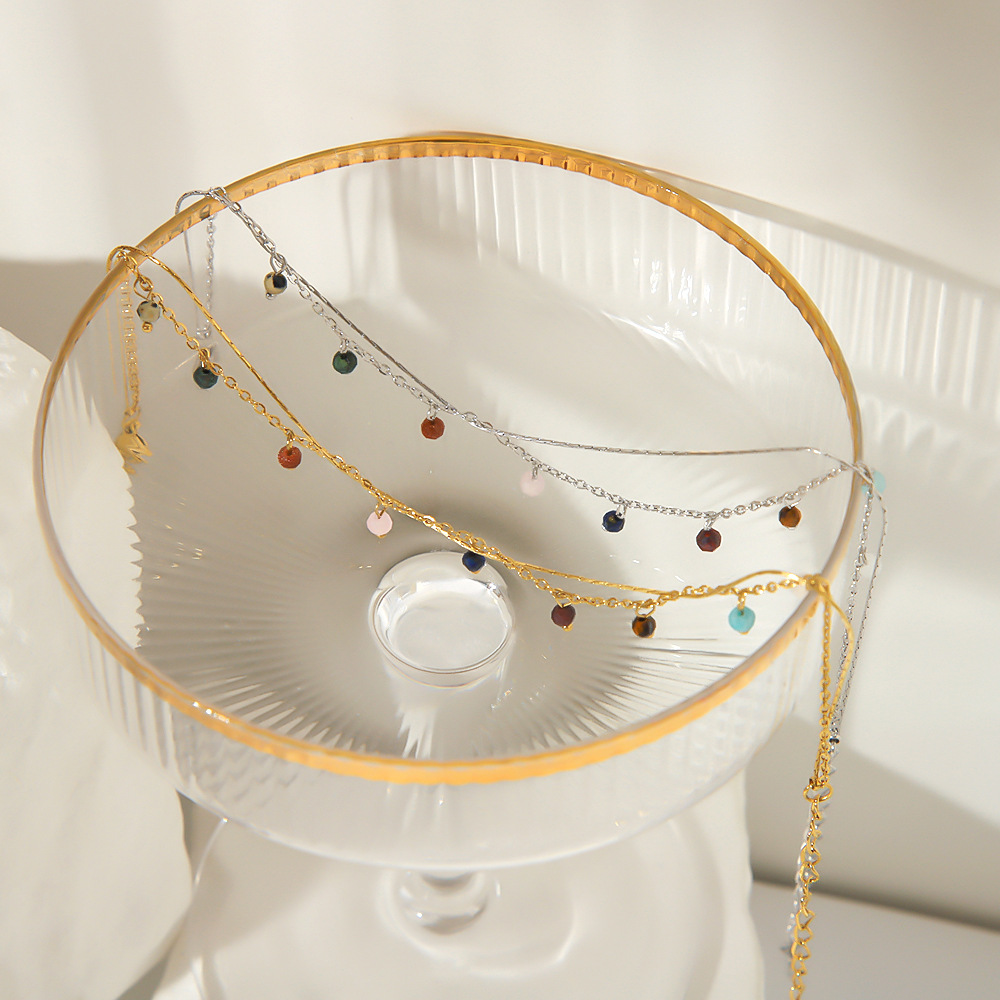 Estilo bohemio nuevo color de acero de titanio colgante de borla de jade natural doble tobillera casual adorno de pie chapado 18K