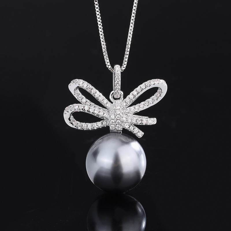 Zhuang Sheng joyería cobre inferior chapado en oro nuevo gris con incrustaciones rebordear moda arco diamante traje femenino 14mm