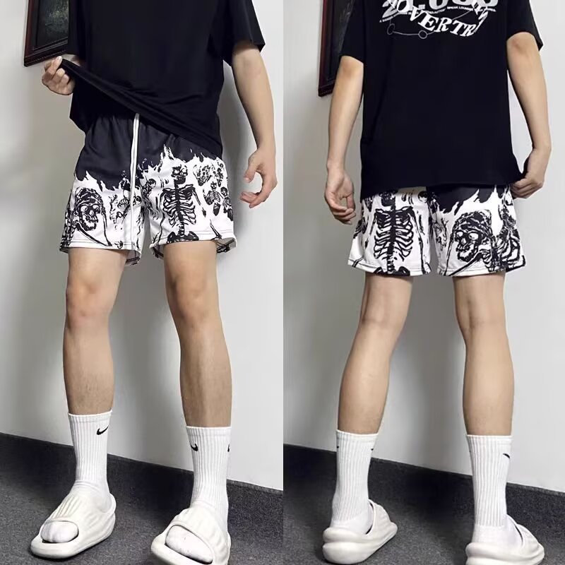 Explosiones transfronterizas al por mayor pantalones cortos de malla de hielo pareja suelta de chicos con pantalones de baloncesto de 3 puntos de verano