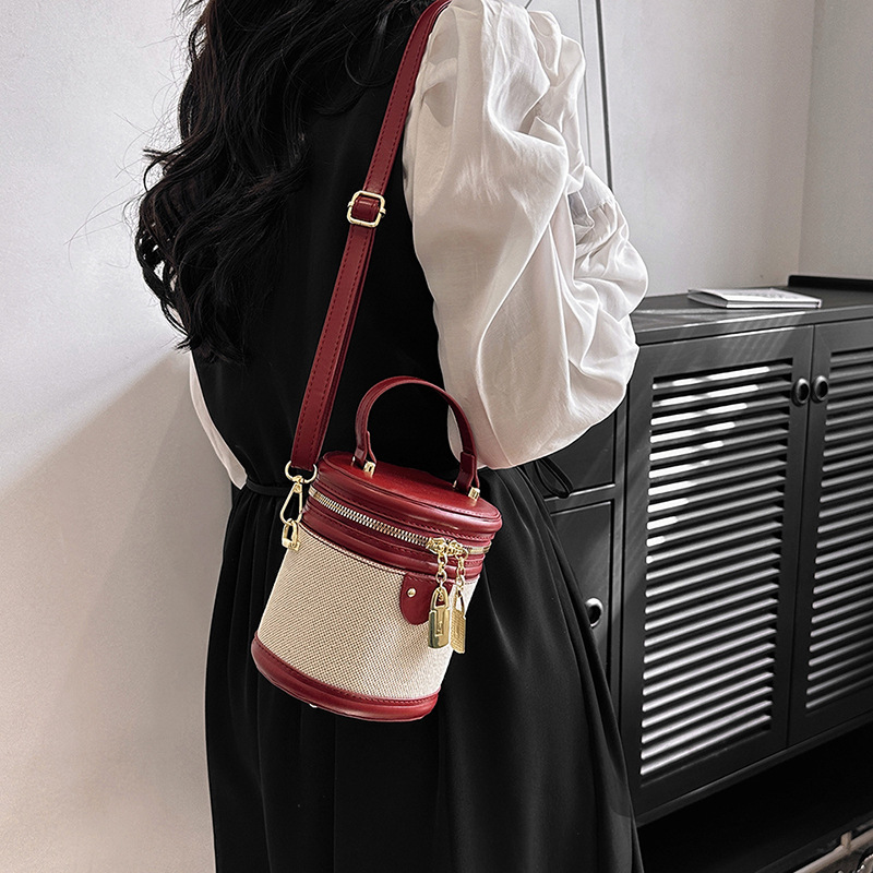 Bolso de cubo de costura de bolso de estilo occidental transfronterizo 2025 nuevo bolso de hombro de color de contraste de moda bolso de mensajero de sentido avanzado