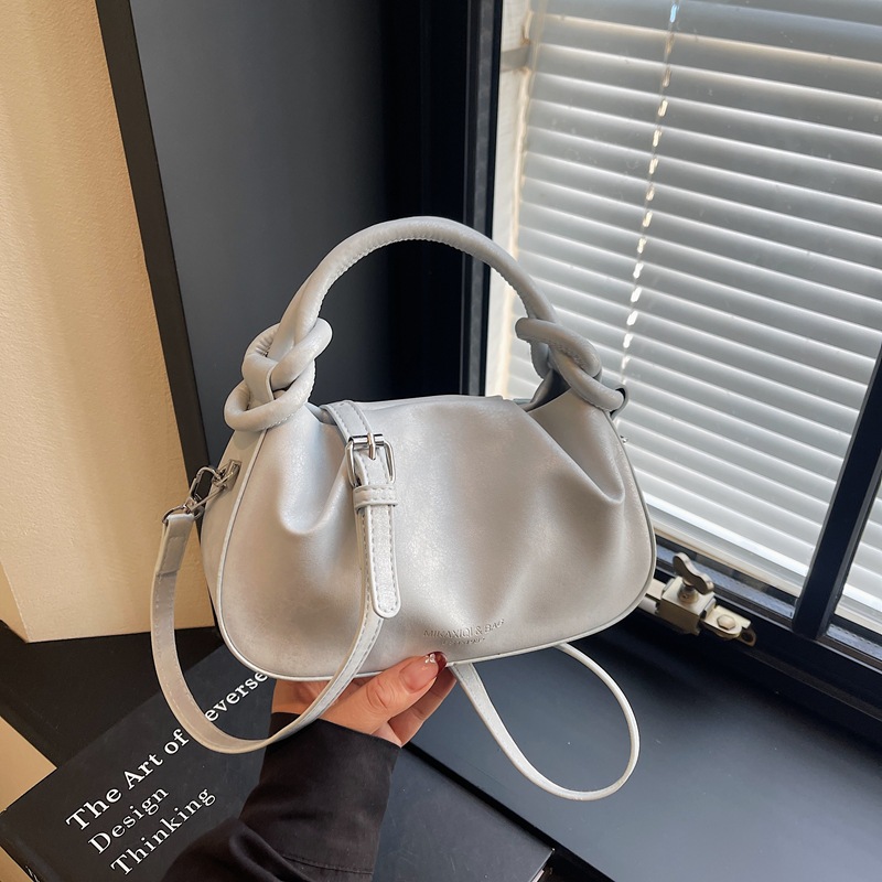 Textura de bolso de mano para mujeres 2026 nueva moda moda diaria de viaje de nicho coreano bolso de hombro