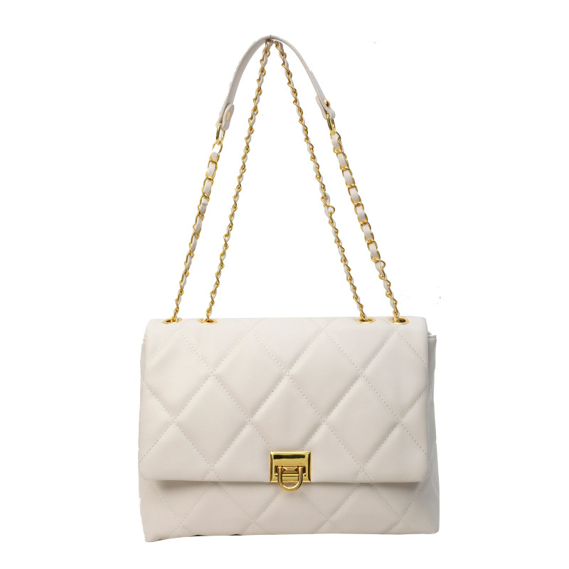 Bolso de mujer de alta calidad de cadena de verano 2025 nuevo estilo simple bolso de hombro de viento fragante, bolso de tela de bordado de diamante.
