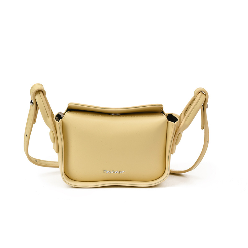 Bolsa de hombro coreana para niños y niñas simple color sólido mini bolso de hombro para niñas letras extranjeras para niños bolso pequeño