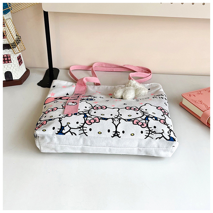 The new fashionable cartoon canvas bag, simple and versatile tote bag, cute commuting single-shoulder tote large bag, is selling well across borders undefined