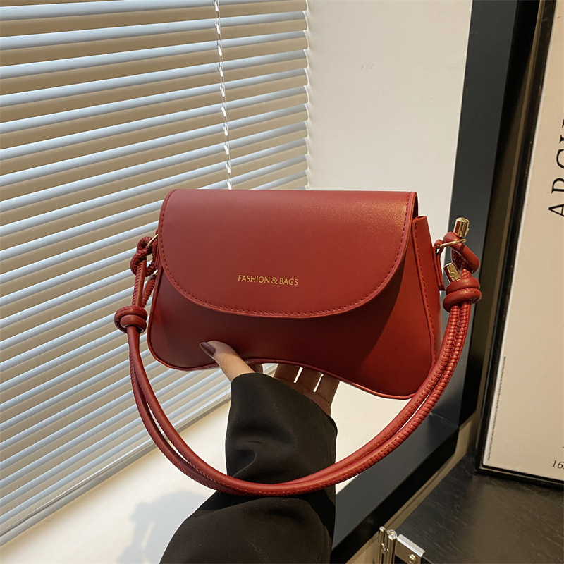 Hong Kong retro color sólido bolso de mujer de estilo extranjero 2025, primavera coreana de textura bolso de hombro de moda bolso de moda