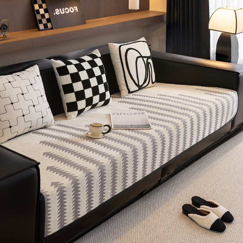 2024 nuevo cojín de sofá Schneider cuatro estaciones lujoso ligero general sensación de alto nivel antideslizante cojín de cuero recto cubierta de tela