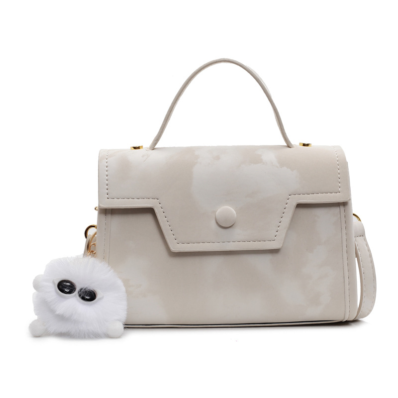 Bolso cuadrado pequeño de mano de estilo occidental de todo fósforo para mujer 2025 nuevo bolso de viaje de ocio ligero bolso de mensajero simple de sentido avanzado