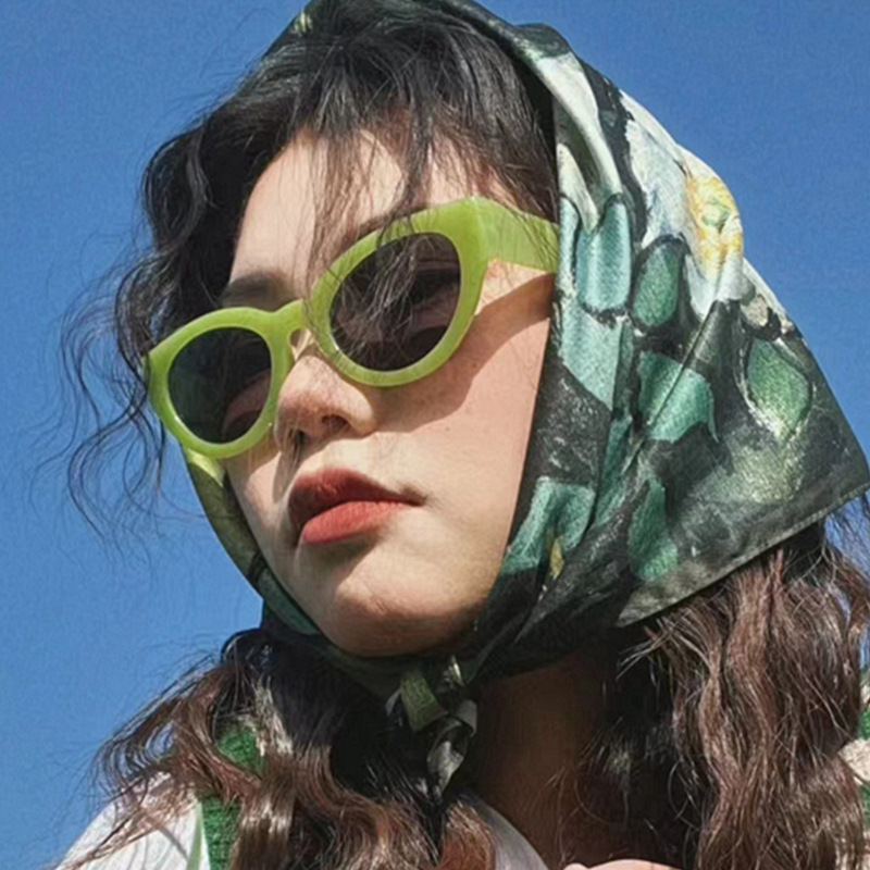 Nuevo europeo y americano retro pequeño marco ojo de gato avanzado cara-buscando pequeña calle hip hop moda todo-juego gafas de sol