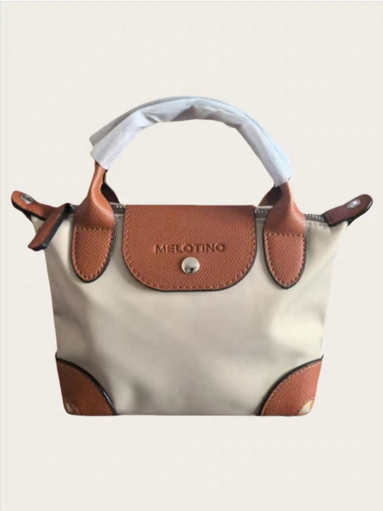 Mini bolso de bolsillo de mano pequeña mujer 2025 nuevo estilo transfronterizo de tela de nylon ligera de moda ocio de hombro bolsa inclinada