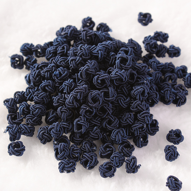 Venta al por mayor piña hebilla DIY material hecho a mano piña nudo chino nudo accesorios 6mm nylon piña nudo bolsa hebilla