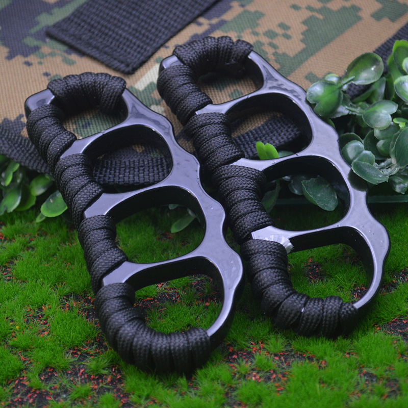 Pea Pequeño anillo de nudillos de cuatro ojos pulsera de anillo de hebilla de cuatro dedos pequeño dedo de vaina de guisante Tigre anillo de boxeo transfronterizo