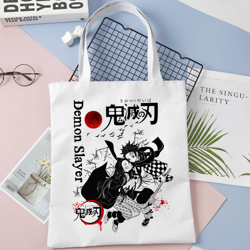 Comercio exterior transfronterizo Demon Slayer impresa bolsa de lona Harjuku bolsa de hombro bolsa de compras portátil de moda para estudiantes
