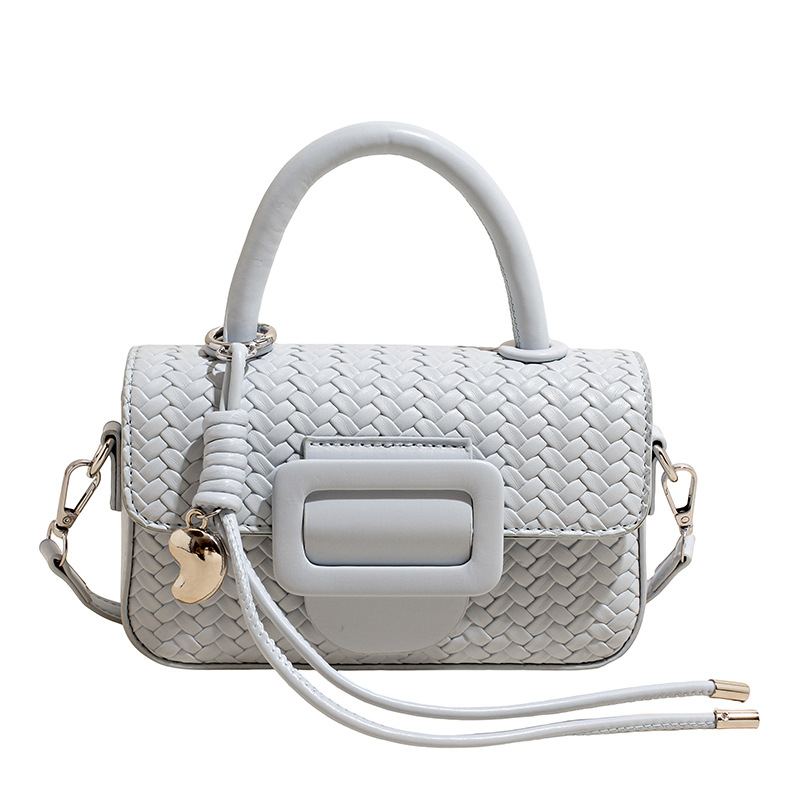 Bolso de mano de alta sensación para mujeres 2026 nueva moda primavera tejida bolso de hombro exquisito bolso de mochila super caliente