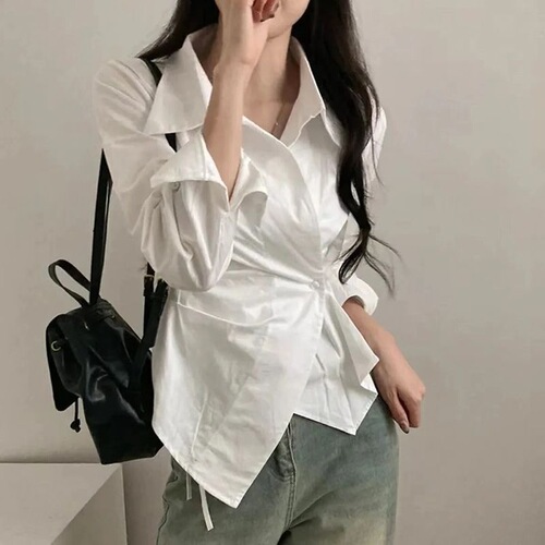A stylish women's new spring collared shirt with a design featuring irregular cinched waist for a slimming effect, striped long sleeves, and a trendy vibe.