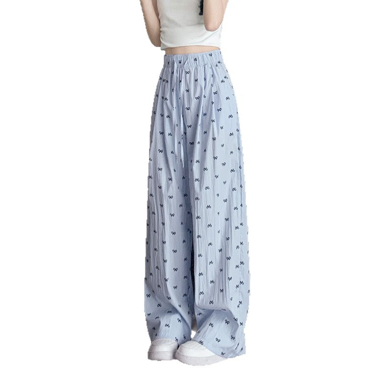 Cuatro estaciones pijamas primavera y otoño dulce delgamiento correa de impresión de arco de verano pantalones largos de invierno pantalones caseros se pueden usar al por mayor