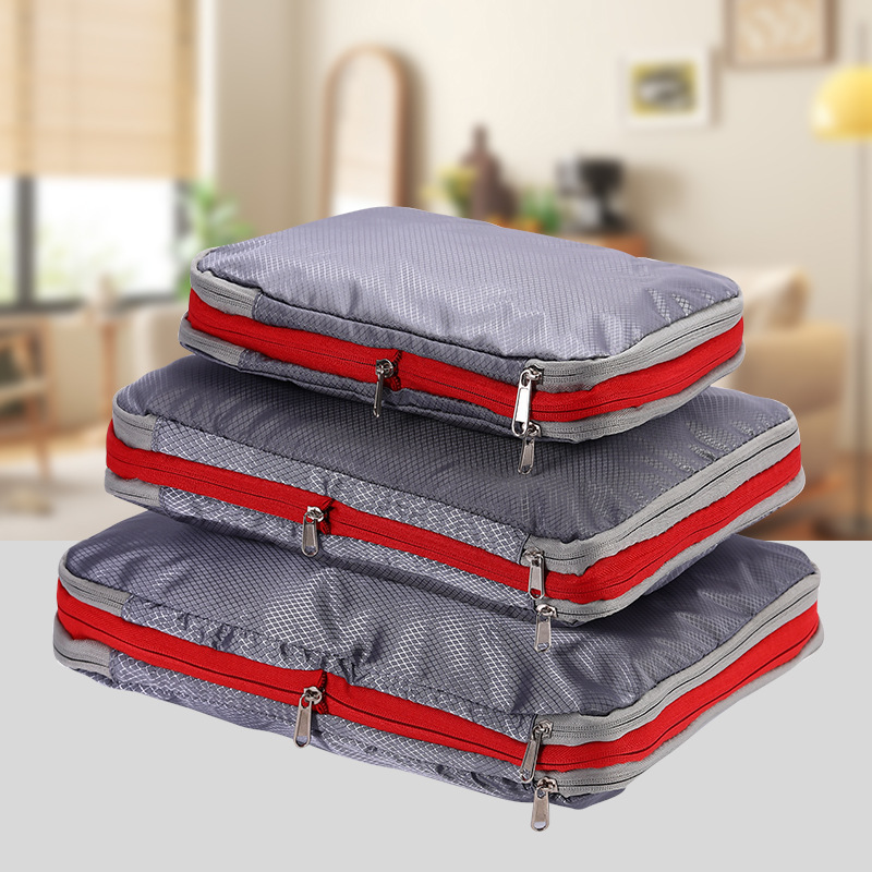 Bolsa de almacenamiento de compresión de viaje explosiva de Amazon Bolsa de almacenamiento de tres piezas de gran capacidad Juego completo de bolsa de almacenamiento de ropa impermeable