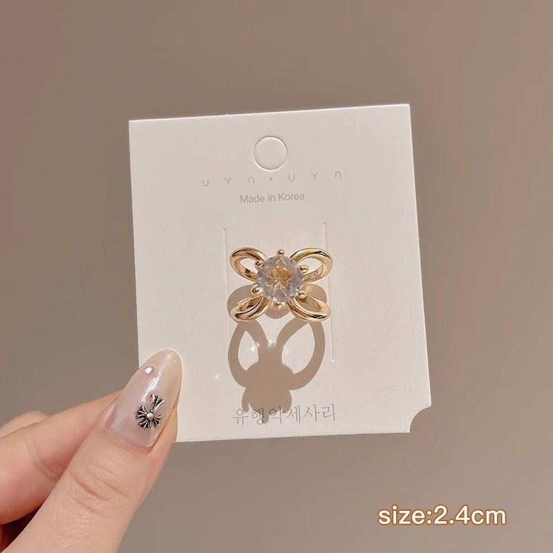 Botón de toalla de seda de alta calidad para mujer de alta gama 2025 nuevo estilo arco esquina anudada camisa de flores serpentina anudada hebilla anudada