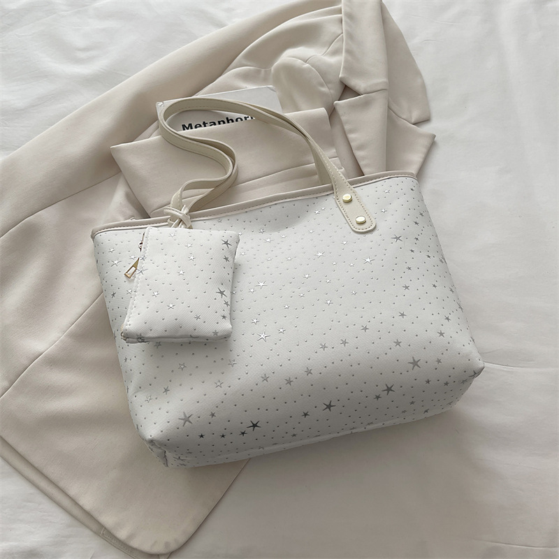 2026 primavera nueva bolsa de hombro de gran capacidad bolsa de brazo universal tendencia transfronteriza dulce viento bolso de mano bolso de mujer