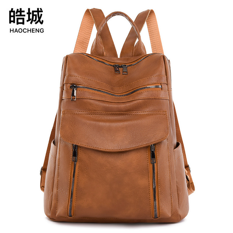 Fábrica al por mayor 2023 nueva mochila de PU para mujer casual moda retro de gran capacidad mochila de viaje de viaje marea