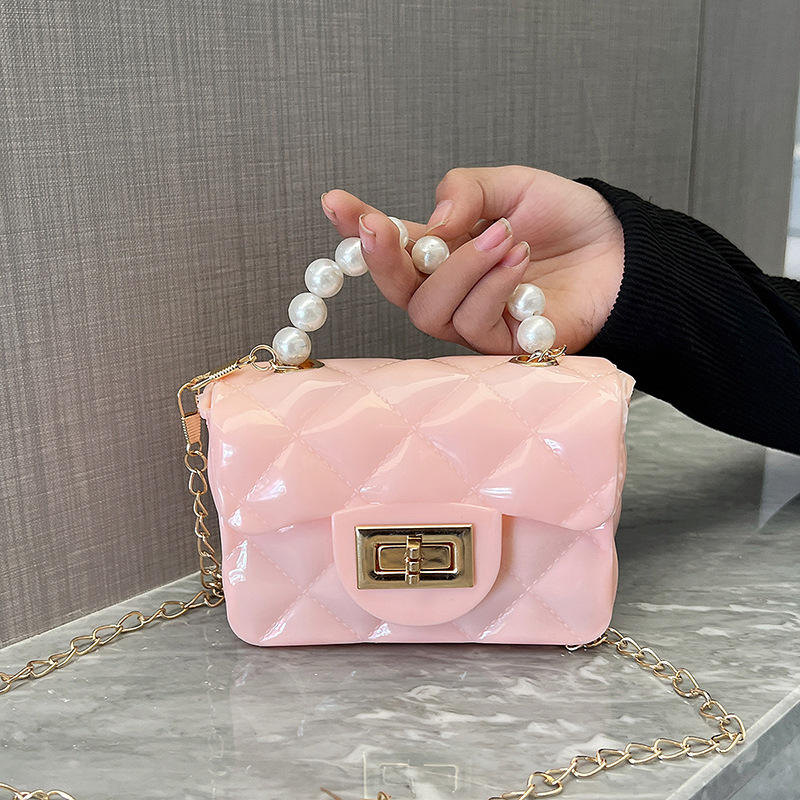 Bolso de los niños 2023 nuevo mini bolso de La jalea rombo estilo occidental pequeña bolsita Perla hombro crossbody bolsa de la cadena portátil