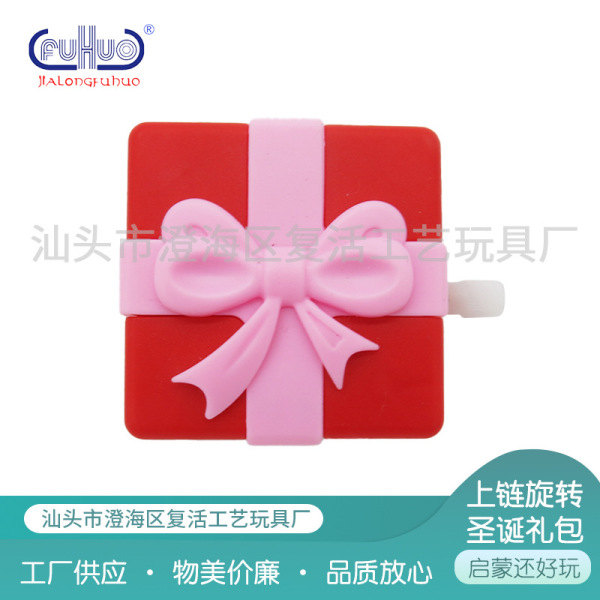 Novelty Funny winding clockwork winding rotating Christmas gift bag Christmas small gift toy in stock supply