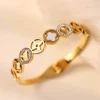 Wide version of four-leaf clover hollowed-out with diamond gold