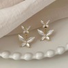 Silver needle, fashionable earrings, simple and elegant design, flowered, high-quality style