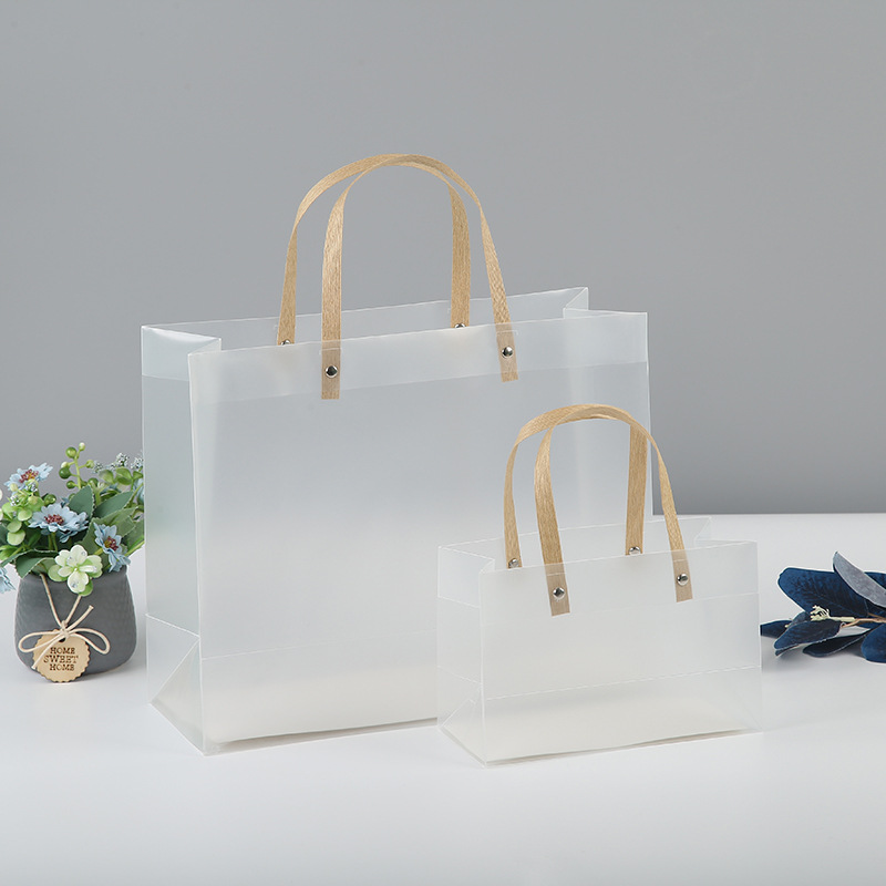 多尺寸横款手提PVCM型透明折叠包装袋可印刷logo服装购物塑料袋子