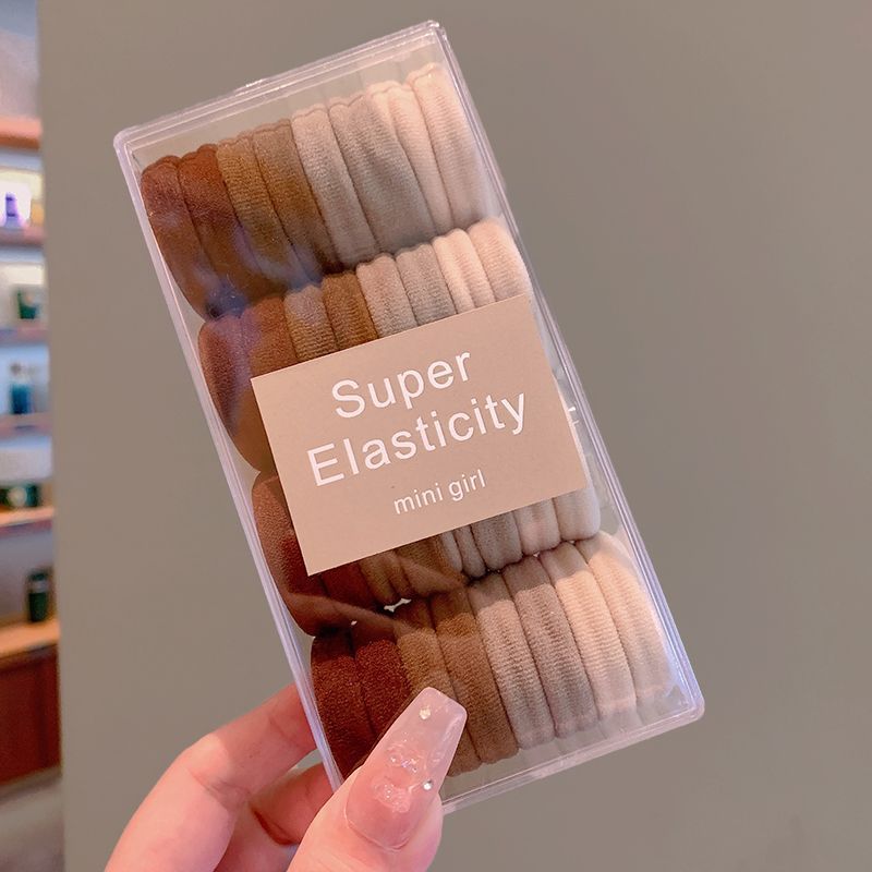 32 cajas de anillos para el cabello de color café