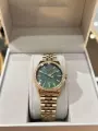 Vv carved gold and green