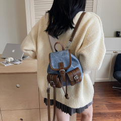 ニッチトレンディクールデニムレトロダメージ通勤バックパック2025新しい女性のカレッジ多用途小型バックパック