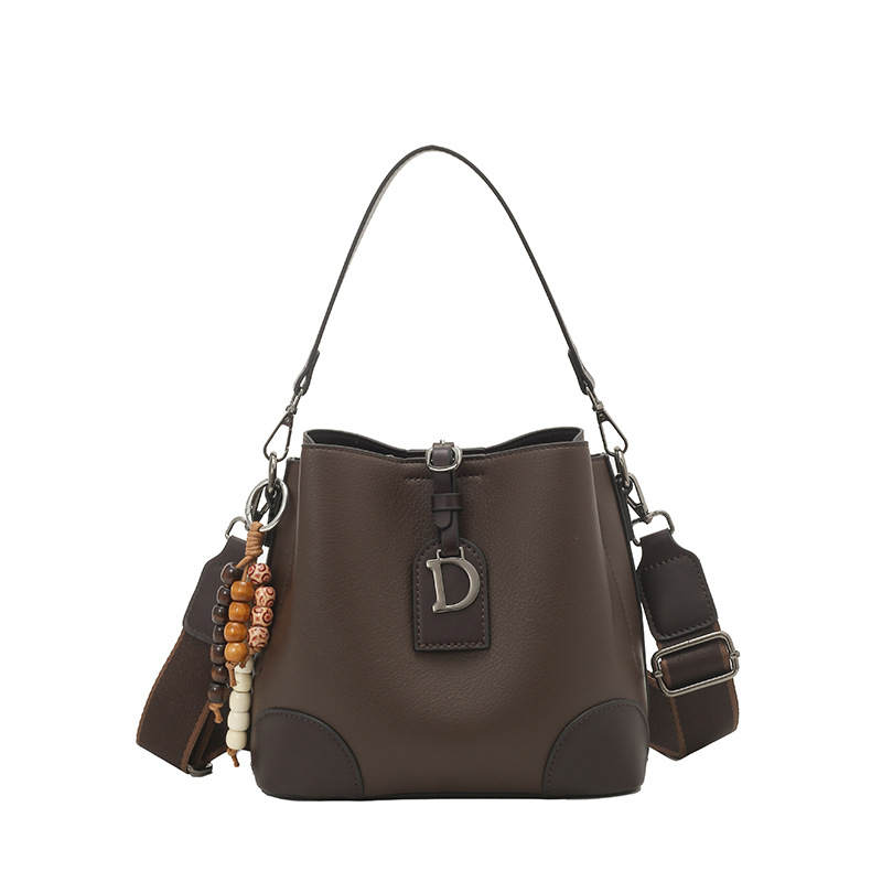 Bolso de nicho retro, bolso de moda, bolso de balde, mujer 2025, nuevo estilo de estilo extranjero, bolso de hombro, bolso de mochila coreano