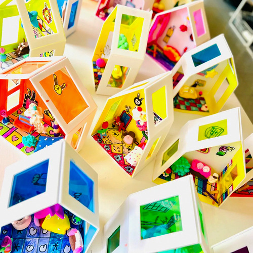 Art and craft area decoration materials for the upper class in kindergarten, including colored transparent glass film for manual painting and drawing.