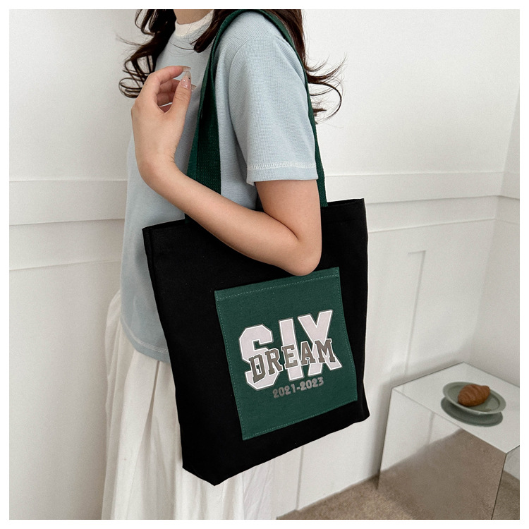 Wholesale of 2025 new casual and fashionable canvas bags, large-capacity single-shoulder bags for college students' shopping, and trendy tote bags undefined
