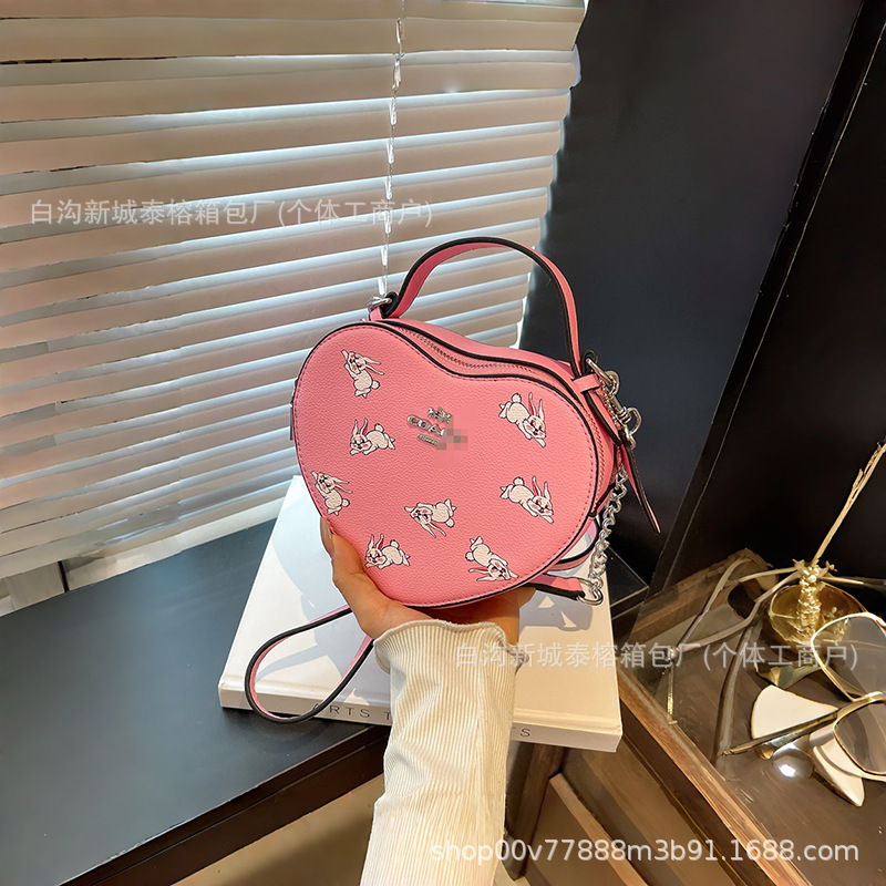 Bolso de mano en forma de corazón de comercio exterior, bolso de hombro de impresión de moda creativa, bolso de hombro simple, bolso de hombro de dama de Europa y América.