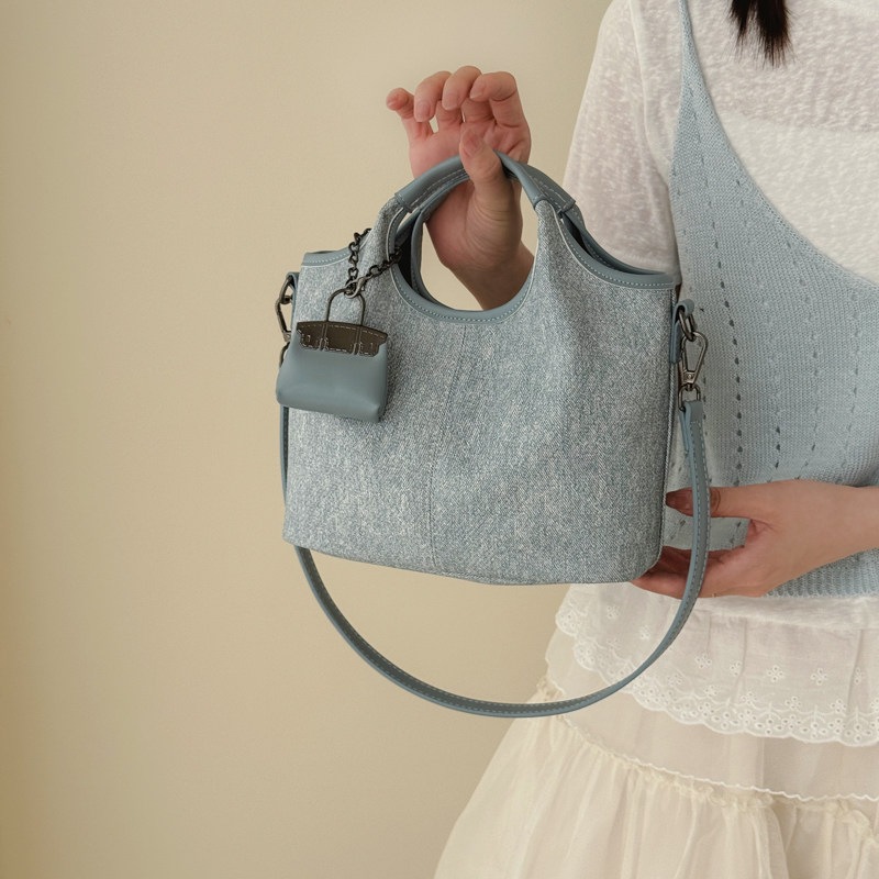 Nuevo balde de cera de piel de verano bolsa casual de aceite 2026 mochila de hombro de gran capacidad popular para mujeres