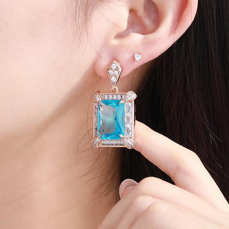 Xuping aleación de cobre color serie de aretes de arco de arco de arco de lujo ligero de estilo largo cuadrado geométrico