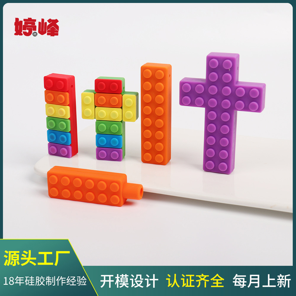 Silicona de grado alimenticio para bebés transfronterizos, bloques de construcción de arco iris para niños, juegos de lápices de mordedor, colgantes de masticación para bebés, palitos molinos