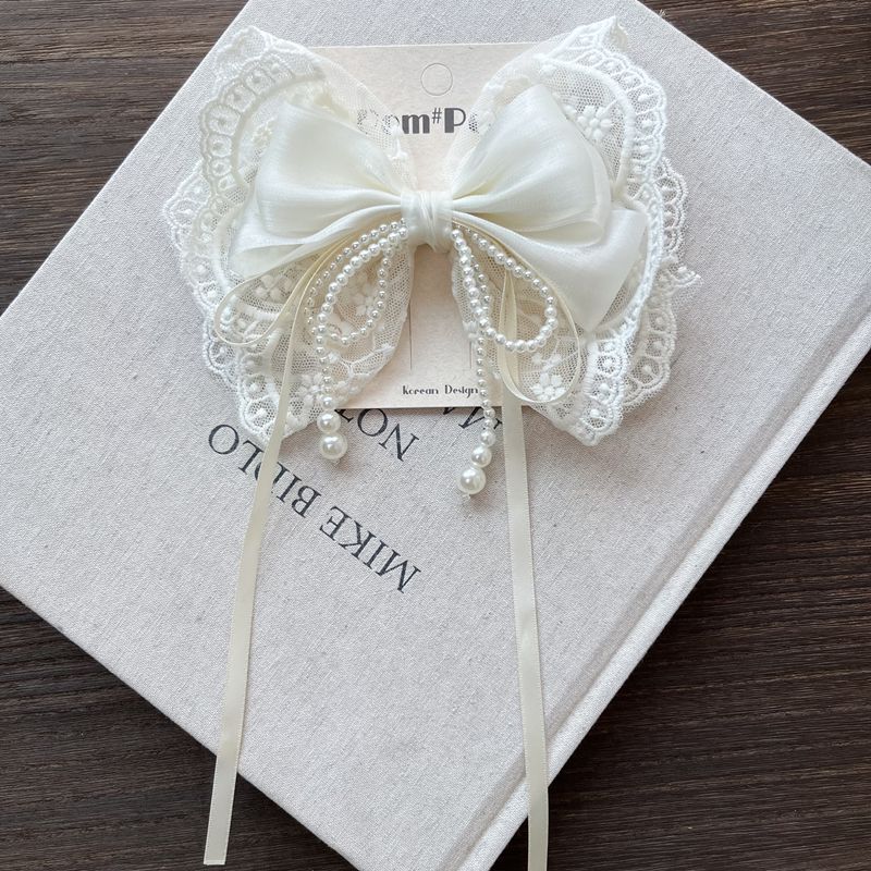 With bow, white