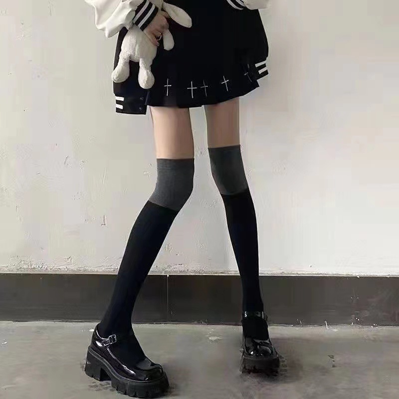 Zhuji calcetines de otoño e invierno al por mayor de las mujeres medias de invierno cálido color sólido forrado de lana gruesa larga Terry sobre la rodilla Calcetines