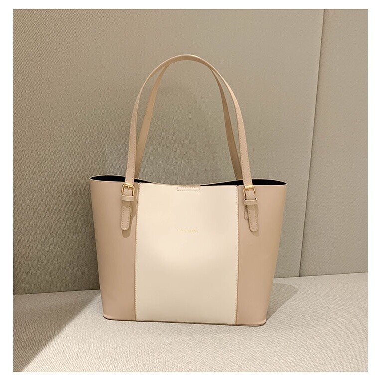 Bolsos de viaje de atmósfera simple mujeres maduras primavera nuevo estilo extranjero de gran capacidad de hombro bolso de mano retro