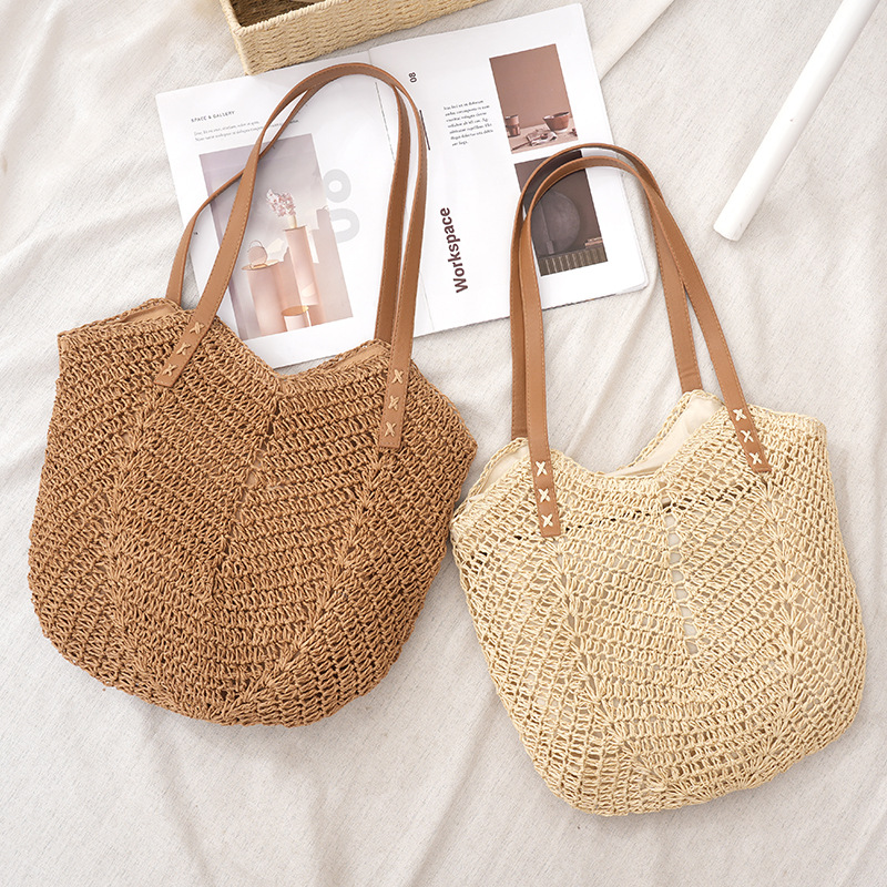 Nueva celebridad de Internet de gran capacidad bolso de viaje de vacaciones playa tejida bolsa de hombro de Europa y América retro bolsa de paja de color sólido