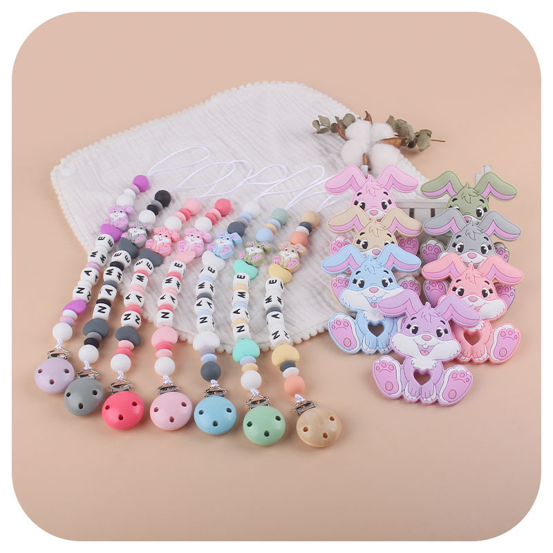 Nuevo bebé suministros chupete cadena DIY bebé nombre silicona teether conejo teether traje