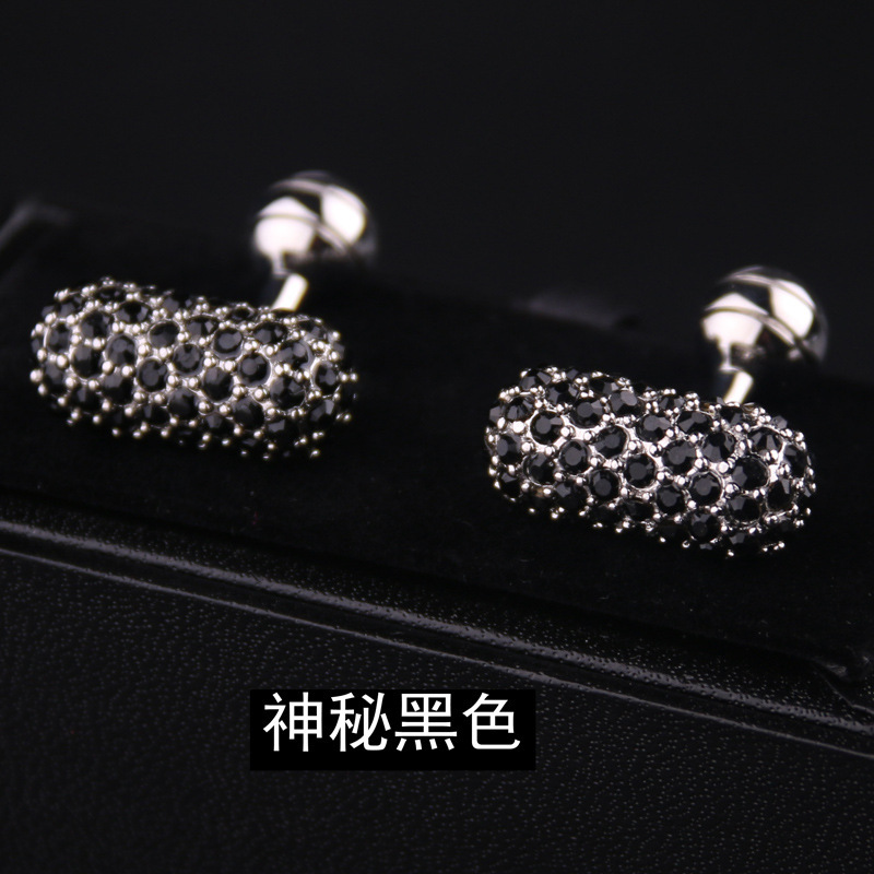 Mysterious black cufflinks