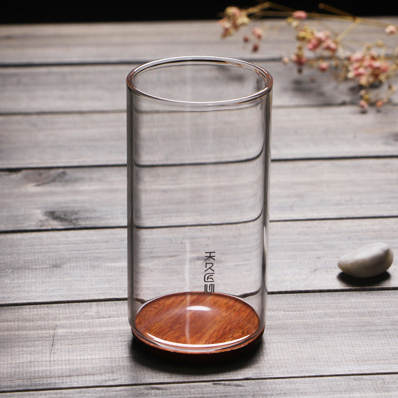 Vidrio transparente grueso resistente al calor inferior de madera aislamiento térmico de doble capa taza de té verde taza de agua creativa flor taza de té Tianjiu glass